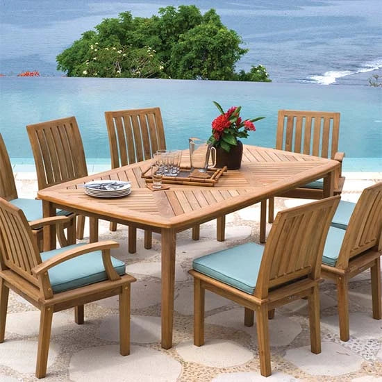 Image of outdoor teak dining table and chairs with cushions