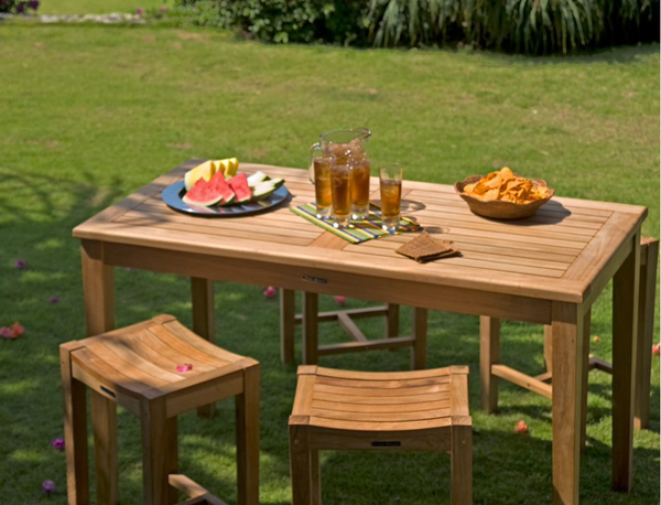 Veranda dining table and bar stools in yard